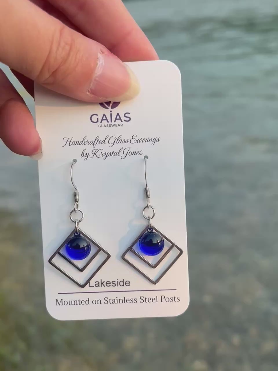 Handmade Lakeside geometric fused glass earrings inspired by peaceful waterfront landscapes, featuring nature-inspired colours and stainless steel posts, crafted by Canadian glass artist Krystal Jones.