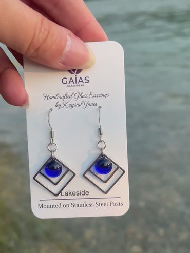 Handmade Lakeside geometric fused glass earrings inspired by peaceful waterfront landscapes, featuring nature-inspired colours and stainless steel posts, crafted by Canadian glass artist Krystal Jones.