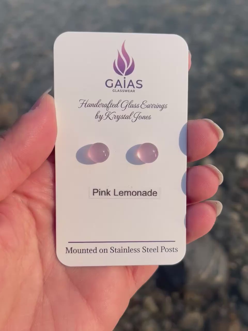 Handmade Pink Lemonade fused glass stud earrings featuring soft pink tones and stainless steel posts, crafted by Canadian glass artist Krystal Jones.