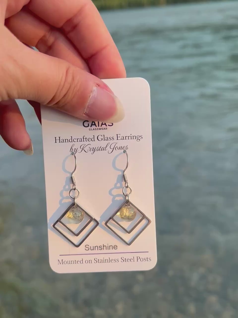 Handmade Sunshine geometric fused glass earrings featuring bright yellow tones and stainless steel posts, inspired by the warmth of sunlight and crafted by Canadian glass artist Krystal Jones.