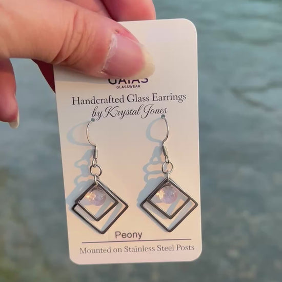Handmade Peony geometric fused glass earrings featuring soft floral-inspired tones and stainless steel posts, crafted by Canadian glass artist Krystal Jones.