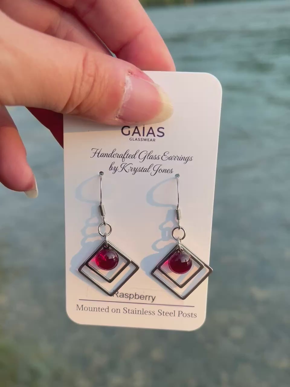 Handmade Raspberry geometric fused glass earrings featuring rich berry-inspired red tones and stainless steel posts, crafted by Canadian glass artist Krystal Jones.