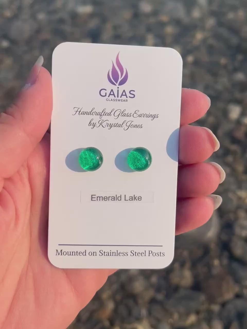Handmade Emerald Lake fused glass stud earrings inspired by Alberta's turquoise waters, with stainless steel posts, crafted by Canadian glass artist Krystal Jones.