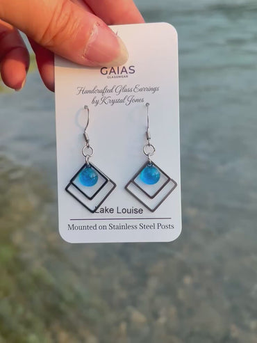 Handmade Lake Louise geometric fused glass earrings inspired by the turquoise waters of the Canadian Rockies, featuring stainless steel posts and crafted by Canadian glass artist Krystal Jones.