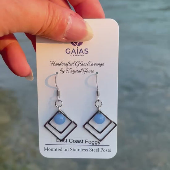 Handmade East Coast Foggy geometric fused glass earrings with soft blue and grey tones and stainless steel posts, crafted by Canadian glass artist Krystal Jones.