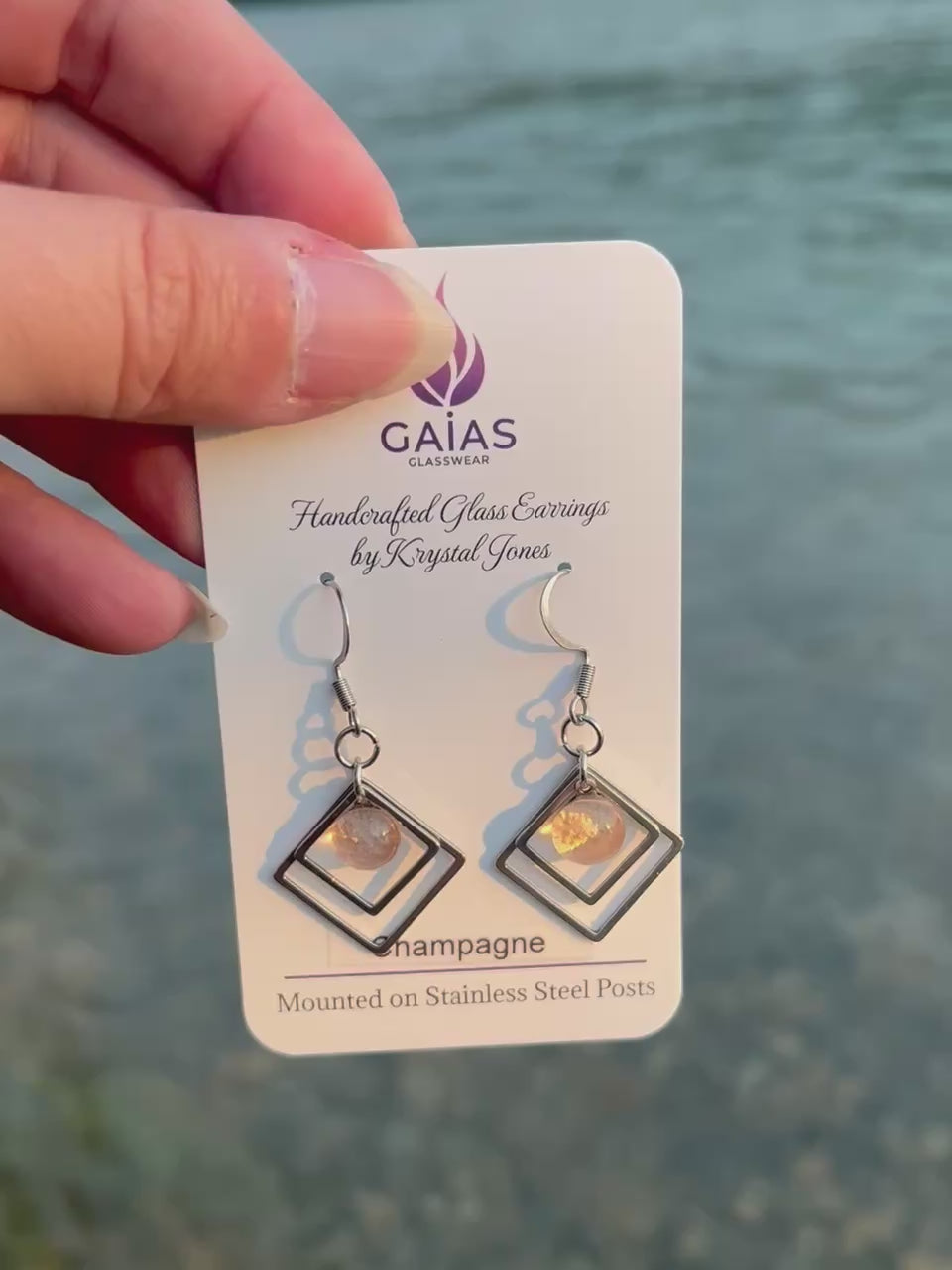 Handmade champagne geometric fused glass earrings with a modern minimalist design and stainless steel posts, crafted by Canadian glass artist Krystal Jones.