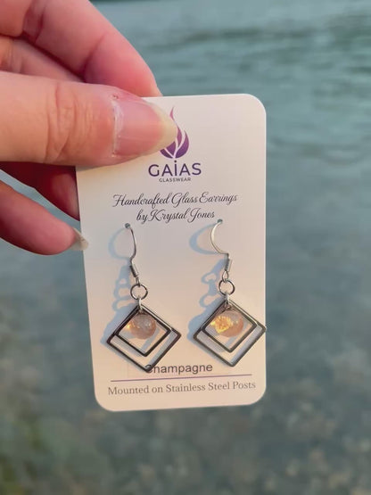 Handmade champagne geometric fused glass earrings with a modern minimalist design and stainless steel posts, crafted by Canadian glass artist Krystal Jones.