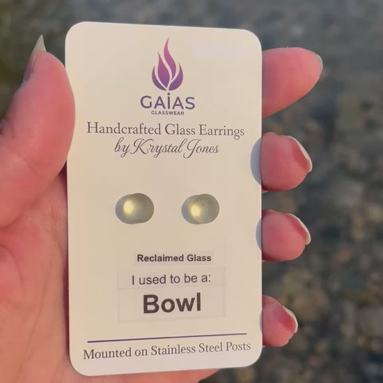 Handmade Eco Yellow Bowl fused glass stud earrings created from reclaimed glass, featuring bright yellow tones and stainless steel posts, crafted by Canadian glass artist Krystal Jones.