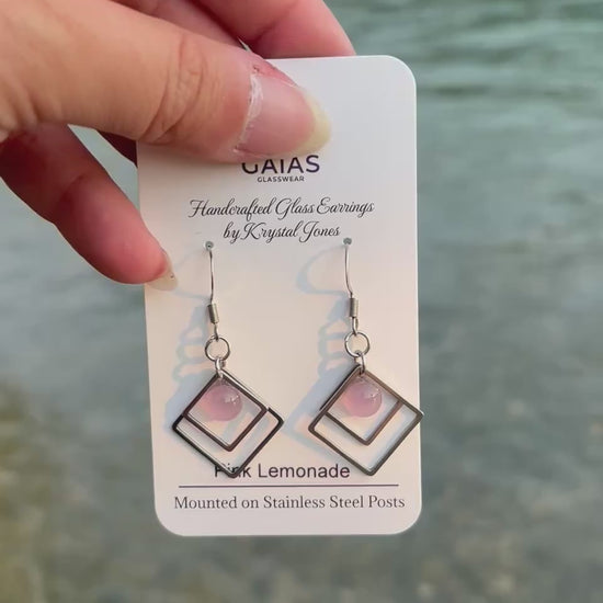 Handmade Pink Lemonade geometric fused glass earrings featuring soft pink tones and stainless steel posts, crafted by Canadian glass artist Krystal Jones.